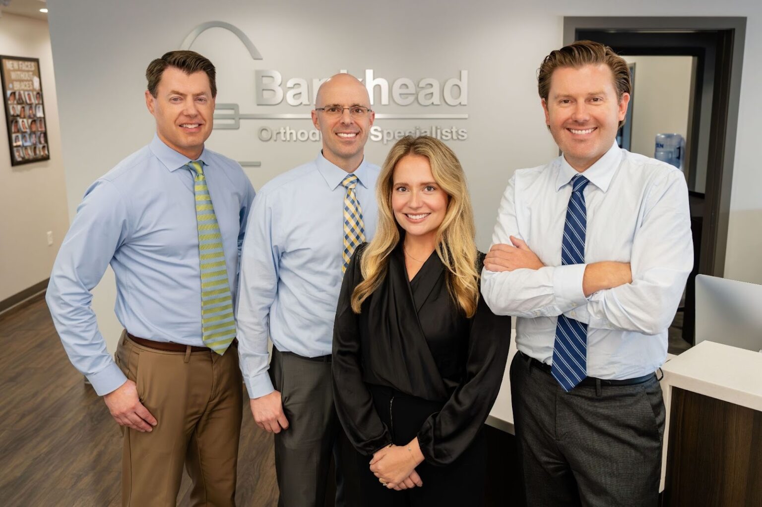 Family smiling after orthodontic treatment at Bankhead Orthodontic Specialists in Lake St. Louis